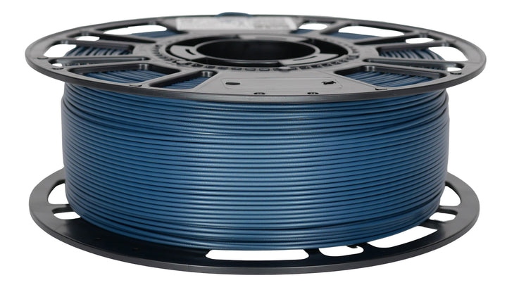 A spool of dark blue 3D printer filament on a black plastic reel, shown against a plain white background. Toolbox Gunmetal Blue Pro PCTG is a perfect color match to Bosch blue